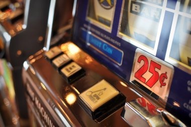 Close-up of Aviator and Sweet Bonanza slot game interfaces on sikowd
